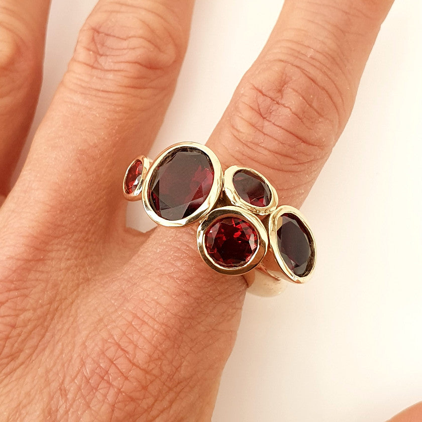 Garnet Octopus Ring in Bronze