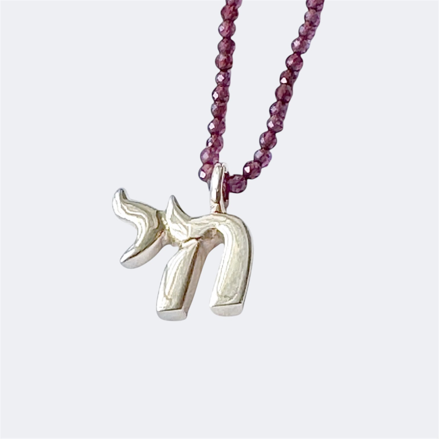 Small Sterling Silver Chai Pendant With Garnet Beads