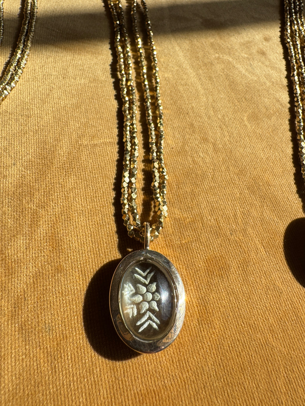 Carved Prasiolite Bronze Pendant with African Brass Beads
